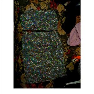 sparkly two set! tang top with skirt! very good condition.